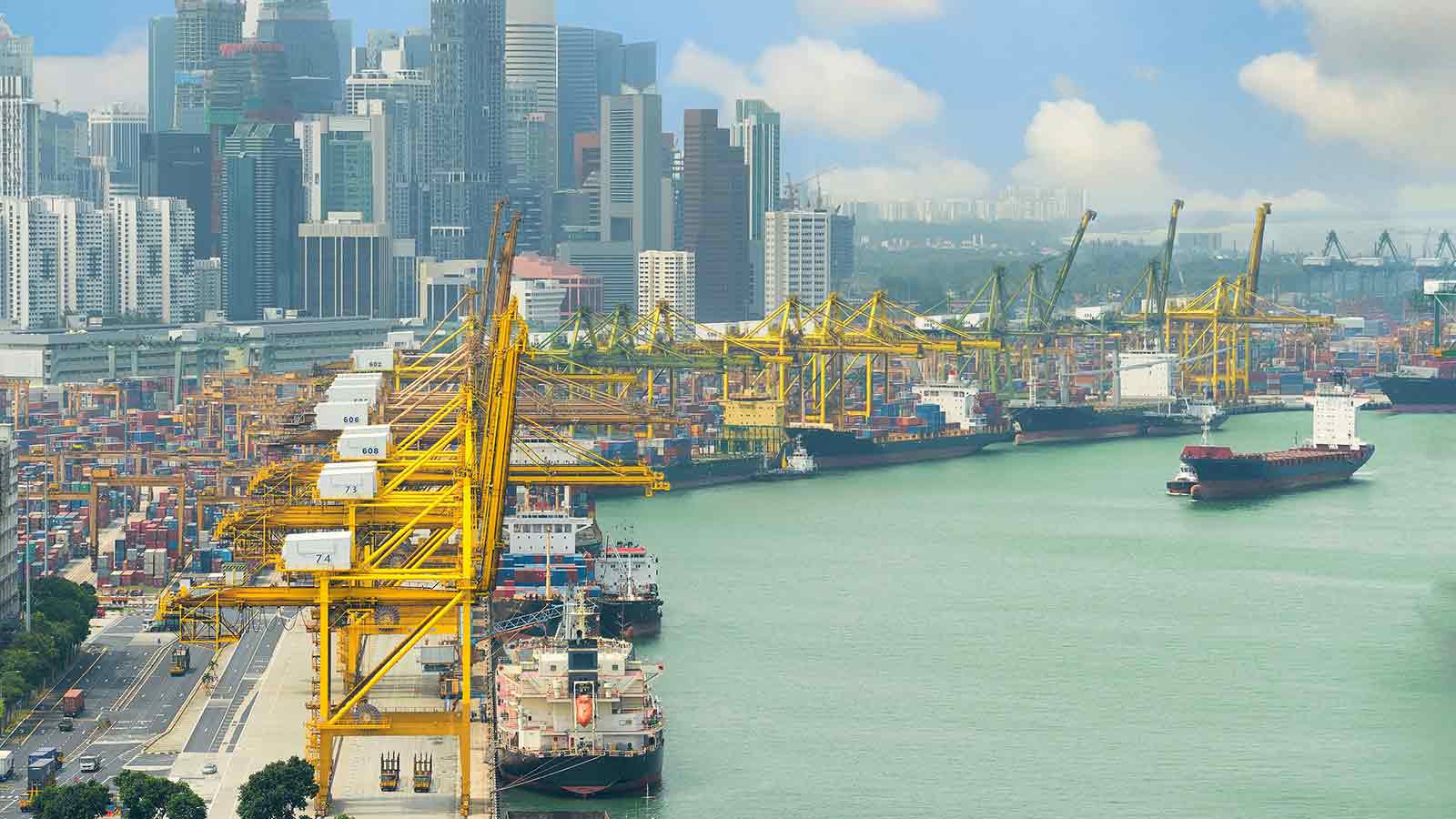 Vista of a shipping port cityscape.  