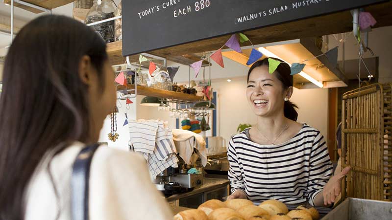 lady behind a counter