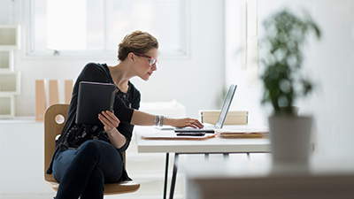 caucasian lady using laptop