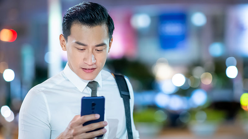 businessman use phone outdoor